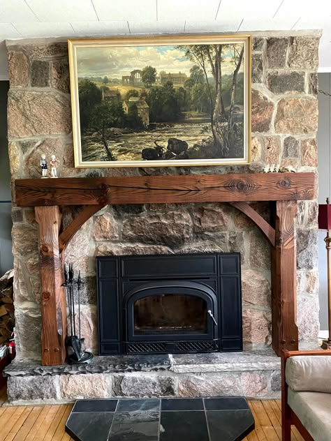 "A beautiful rustic pine fireplace mantel with legs, made from reclaimed pine wood. The mantel is from an 8\" x 8\" pine beam and the legs are from a 6\" x 6\" pine beam. Comes standard with 48\" legs (or shorter). They can be made any size. - Available in any size - Available in any color - Available in any finish (hand hewn, distressed, clean, etc.) Pine is a beautiful wood that is smoother than spruce. You will see different colors in the grain of the pine beams (see photos). If you need help Mantel Installation, Wood Beam Fireplace, Rustic Farmhouse Fireplace, Beam Fireplace, Rustic Stone Fireplace, Rustic Fireplace Mantels, Fireplace Mantel Shelf, Reclaimed Wood Beams, Wooden Corbels