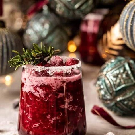 Frosted Mistletoe Margarita Punch - Half Baked Harvest Mistletoe Margarita, Margarita Punch, Tieghan Gerard, Festive Holiday Cocktails, Cranberry Margarita, Half Baked Harvest Recipes, Orange Liquor, Harvest Recipes, Frozen Cranberries