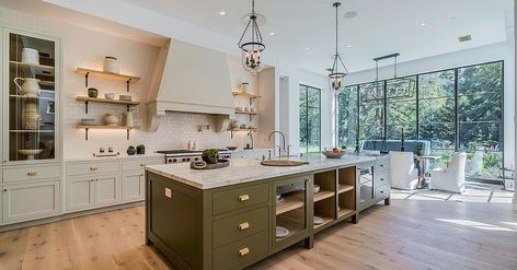 Color your Home: How to Use Olive Green Inside your House. A dark olive green island with matte finish adds color to this spacious modern kitchen. Dining Room Drapes, Olive Kitchen, Olive Green Kitchen, Olive Green Paints, Green Kitchen Island, Green Shelves, Green Island, Green Kitchen Cabinets, Beige Kitchen