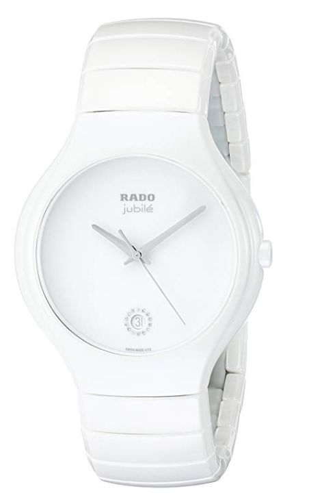 White ceramic case with a white ceramic bracelet. Fixed white ceramic bezel. White dial with silver-tone hands. No markers. The rado name appears below the 12 o'clock position. Date display at the 6 o'clock position surrounded by diamonds. Battery operated quartz movement. Scratch resistant sapphire crystal. Solid case back. Case diameter: 40 mm. Deployment clasp. Water resistant at 30 meters / 100 feet. Functions: hours, minutes, seconds, date. Rado true jubile mens watch r27695722. Rado Watch, Ceramic Bracelet, Ceramic Watch, Watch Lover, Analog Watch, White Dial, Wrist Watches, O Clock, Sapphire Crystal