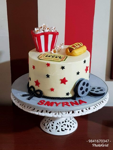 Movie theme cake #Nofondantcake #Buttercreamcake  For a Movie buff with Movie Ticket, Movie Reel and her favourite Popcorn and Hotdog ...  Cake Flavor: Chocolate truffle cake covered in buttercream with fondant accent Popcorn Cake Design, Bollywood Theme Cake Ideas, Birthday Cake Movie Theme, Movie Theme Cake Ideas, Movie Reel Cake, Movie Night Cake Ideas, Bollywood Theme Cake, Movie Theater Cake, Movie Cake Ideas