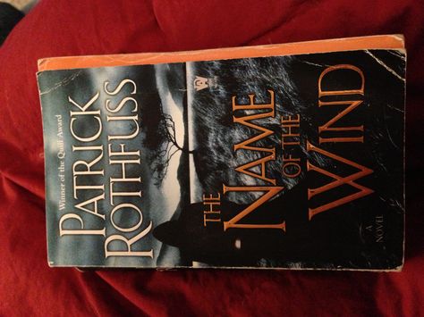 The name of the Wind - Patrick Rothfuss. Recommended by Erin C. Available on Overdrive Patrick Rothfuss Books, The Name Of The Wind, Patrick Rothfuss, Reading Ideas, Book Binding, Book 1, The Wind, Bestselling Author, Book Club