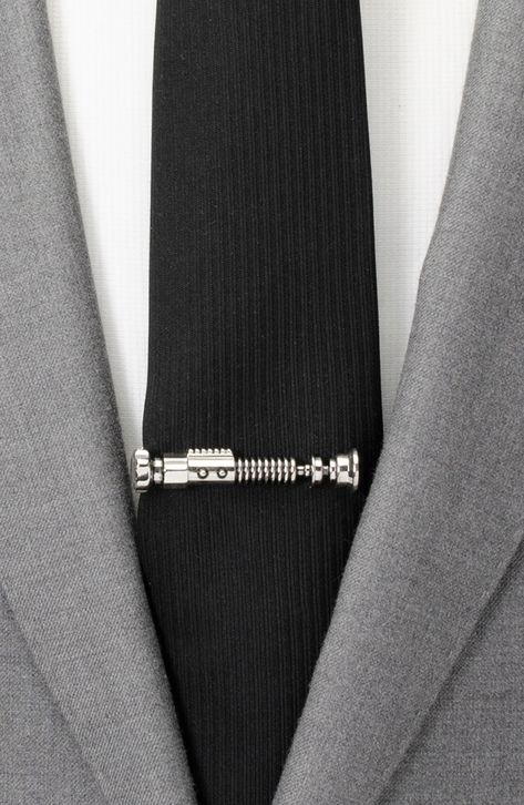 - A stylish and functional way to show your love of Star Wars. #StarWars #TieClip Starwars Groomsmen Proposal, Lightsaber Boutonniere, Star Wars Cufflinks, Star Wars Quinceanera Theme, Star Wars Wedding Details, Star Wars Boutonniere, Star Wars Wedding Decor, Subtle Star Wars Wedding Ideas, Subtle Star Wars Wedding