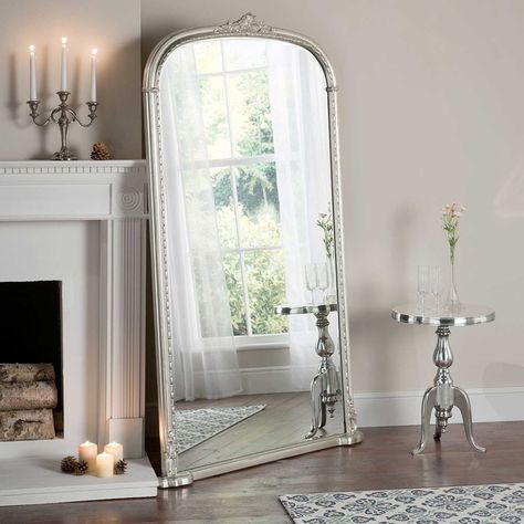 The Windsor Silver Leaner Mirror features a simple thick polyurethane frame for a highly durable build in a stunning silver finish that has been handcrafted with incredible attention to detail. Boasting ornate patterns in the middle of the curved top frame and along the edges, it offers a statement mirror that will instantly grab your attention. Created as a full length floor standing mirror, it's ideal for hallways or bedroom settings to make getting ready, much easier.   Dimensions     Width - Leaner Mirrors, Black Framed Mirror, Hanging Mirrors, Mirrors Uk, Victorian Mirror, Bevelled Mirror, Floor Standing Mirror, Framed Mirrors, Leaner Mirror