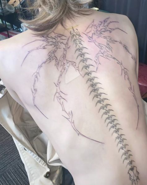 Spine with wings back tattoo Spine Wing Tattoo, Closed Wings Tattoo, Back Tattoo Bones, Spine Tattoos With Wings, Spine Tattoo Skeleton, Spine Tattoos Wings, Spine Tattoo Aesthetic, Skeleton Wing Back Tattoo, One Wing Tattoo