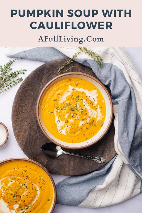 Pumpkin Cauliflower Soup is a hearty, healthy cool weather recipe. It's easy to make with minimal prep time, naturally low carb and gluten free. This velvety smooth soup will be a staple for those chillier days. With plenty of herbs and spices, you will love this warming comfort food. #PumpkinCauliflowerSoup #PumpkinSoup #HealthySoupRecipe Cauliflower Pumpkin Soup, Pumpkin And Cauliflower Recipes, Pumpkin And Cauliflower Soup, Low Carb Pumpkin Soup, Pumpkin Cauliflower Soup, Cauliflower Bacon Soup, Pumpkin Cauliflower, Pumpkin Sweet Potato Soup, Vegan Pumpkin Soup