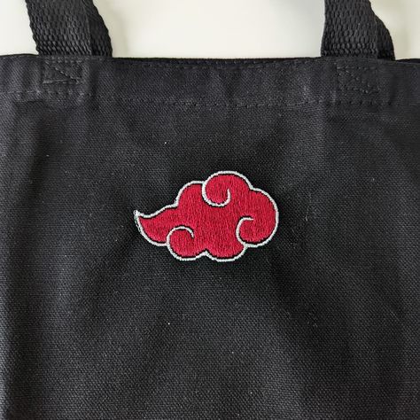 Show-off your favourite anime or video games on a embroidery Totes! About the Totes The totes are 35cm * 40cm, available in white or black All totes are embroiled in Canada Akatsuki Embroidery, Black Tote Bag Embroidery, Naruto Bag, Cloud Embroidery, Akatsuki Cloud, Outfit Pieces, Embroidery Bags, Crochet Bracelet, Game On