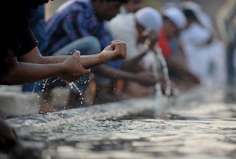 Muslims perform their ablutions in the inner courtyard of the 17th century Jama Masjid mosque in New Delhi, India, before early morning Eid al-Adha prayers on November 7, 2011. Thousands of Indian Muslims crowded in and around the mosque, the largest in India, to attend prayers in the first morning of Eid-al Adha or Festival of Sacrifice. India has the second largest population of Muslim followers in the world with over 150 million faithful. (Roberto Schmidt/AFP/Getty Images Wudu Steps, Native American Church, Newcastle University, Zen Buddhism, Vitamins For Kids, Kuching, Wet Dreams, Islamic Quotes, About Uk