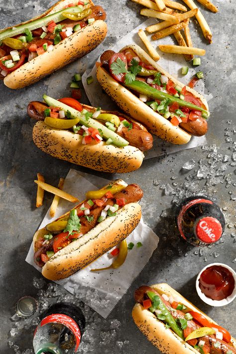 Laurie Proffitt creates magic with every photograph she takes. The styling and intentional placement of these hotdogs allows her to capture them in an elevated and more sophisticated light. #photography #food #foodstyling #chicagofoodphotographer #flatlay #foodphotography #brandphotography #hotdog #commercialphotography #stilllifephotographer #stilllifephotography #tabletopphotography #productphotographer #productphotography  #propstyling  #proffittphoto #bockoscreative Sport Peppers, Hot Dog Toppings, Food Photography Background, Food Gallery, Chicago Food, Food Content, Food Advertising, Food Photography Inspiration, Food Photography Tips