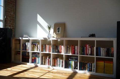 I would love to connect two Kallax shelving units as they did in the above photo. Does anyone have any thoughts on how it was done? Long Low Bookcase, Cube Ikea, Horizontal Bookcase, Ikea Toy Storage, Low Bookshelves, Kallax Shelving Unit, Wide Bookcase, Hacks Ikea, Ikea Expedit