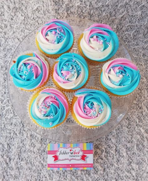 Vanilla cupcakes with with blue pink and white rainbow buttercream swirl Pink And Blue Frosting Cupcakes, Pink And Turquoise Cupcakes, Pink And Blue Barbie Party, Pink Purple Blue Cupcakes, Pink And Blue Swirl Cupcakes, Pink Blue Cupcakes, Pink And Blue Cupcakes, Bday Cupcakes, Rainbow Buttercream