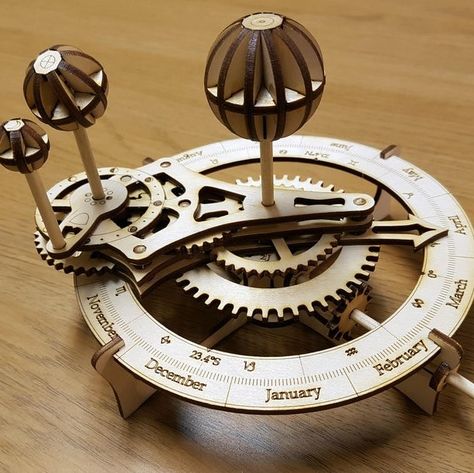 My budding engineer would love this solar system orrery kit! Planetary Model, Solar System Model, Wooden Model Kits, Wooden Gears, Wooden Items, Making A Model, Black Panthers, Building Instructions, Gothic Steampunk