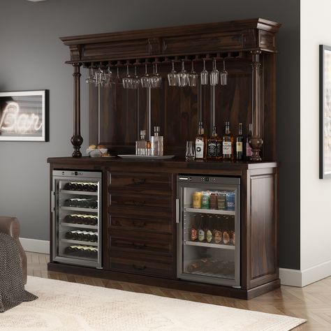 Your home bar should be a place of connection or fun and so do our Nahant Traditional Home Bar Hutch with Mini Fridge Space makes that possible. This wine bar hutch is a mix of practical design and inviting charisma that makes it the perfect backdrop for memorable gatherings, ensuring your drinks are always within reach and your home bar feels warm and welcoming. Specifications: • Crafted from solid wood, this home bar hutch with mini fridge space is a homage to traditional style displaying intricate craftsmanship that exude both character and longevity. • Atop design of this wine bar hutch with mini fridge space features cornice crown molding, a reeded pattern, and column detailing along with ample surface that is perfectly suitable for placing all your large home bar accessories with a c Mini Bar With Sink And Fridge, Wine Bar Home Ideas, Liquor Cabinet Built In, Hutch With Mini Fridge, At Home Wine Bar, Small Bar Wall, Modern Small Bar Ideas For Home, Mancave Bar Ideas, Bar Corner Ideas For Home