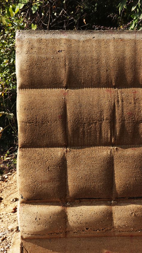 Unearthing the quality of rammed earth through fabric formwork Rammed Earth Bricks, Fabric Formwork, Rammed Earth Architecture, Rammed Earth Construction, Mud Hut, Broken Concrete, Colored Concrete, Earth Projects, Rammed Earth Wall