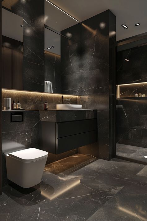 Luxury Defined • Black marble walls with white veining reach from floor to ceiling • Illuminated mirror adds modern sophistication • Wall-mounted toilet and floating vanity with white basin enhance the sleek design • Golden under-vanity lighting complements the marble's hues • Glass shower stall and warm recessed lighting give a spacious feel to the opulent bathroom. Black Downstairs Toilet Ideas, Black Marble Shower Bathroom, Industrial Chic Bathroom, Nero Marquina Bathroom, Opulent Bathroom, Glass Shower Stall, Mafia House Aesthetic, Mafia House, Bathroom Industrial Chic