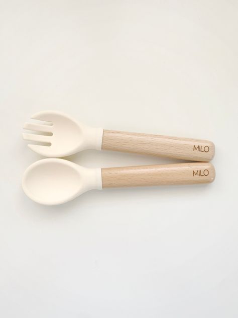 This listing is for a set of Spoon & Fork  with the option to personalize on the wooden part of the utensils with laser engraving. Available in cursive or all caps (default to caps if not stated). Premium Non-toxic, BPA Free, Latex Free, Nitrosamine Free, Phthalate Free, Eco-Friendly, 100% Food grade Silicone Spoon & Fork Set with Natural Beech wood. The beech wood handle is lightly coated with food-grade, water-based paint and is perfectly safe for kiddos to chew on. * Microwave safe * Dishwash Porsche Mom, Personalized Spoon, Silicone Baby Toys, Silicone Utensil Set, Spoon And Fork Set, Baby Utensils, Baby Room Neutral, Baby Bowls, Silicon Utensils