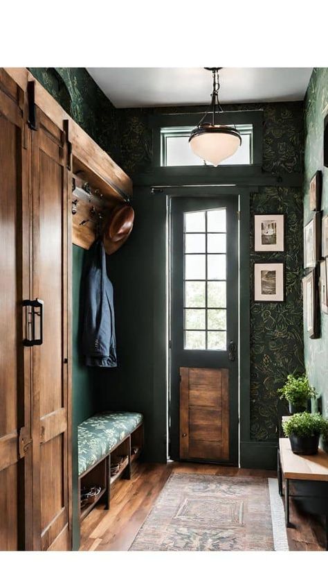 Emerald Green Mudroom, Green Wall Black Trim, Green Mudroom With Wallpaper, Moody Wallpaper Entryway, Moody Green Entryway, Wallpaper With Wood Trim, Dark Green Mudroom, Green Walls Black Trim, Moody Green Living Room