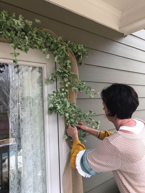 Front Porch Ideas For Easter Spring Decorations, Above The Front Door Decor Outside, Front Door Flower Arrangements, Vines Around Front Door, Front Door Floral Arrangements Entrance, A Frame Front Door, Boutique Front Door Entrance, Outdoor Front Door Garland, Front Door Porch Decor Ideas