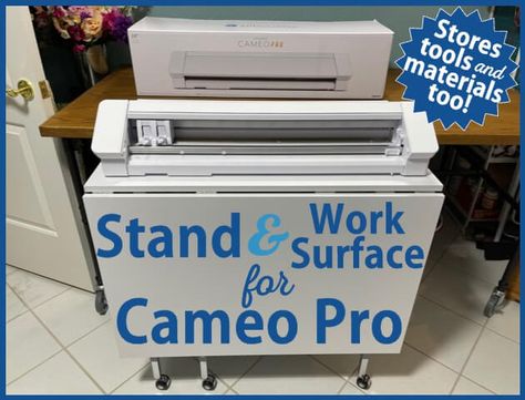 Cameo 4 Pro on a stand that also holds 24" rolls of vinyl, the 24" cutting mat, and tools and supplies for using the machine. Silhouette Cameo Storage, Silhouette Cameo Office Setup, Silhouette Cameo Pro, Cameo Pro, Silhouette Cameo 4 Pro, Silhouette Cameo Projects Beginner, Build A Table, Silhouette Cameo Crafts, Art Studio Organization