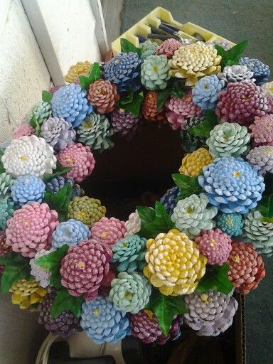 Painted pinecone wreath Pine Cone Flower Wreath, Painted Pinecones, Cone Crafts, Pine Cone Art, Wreath Project, Pine Cone Decorations, Cones Crafts, Pinecone Wreath, Pine Cone Crafts