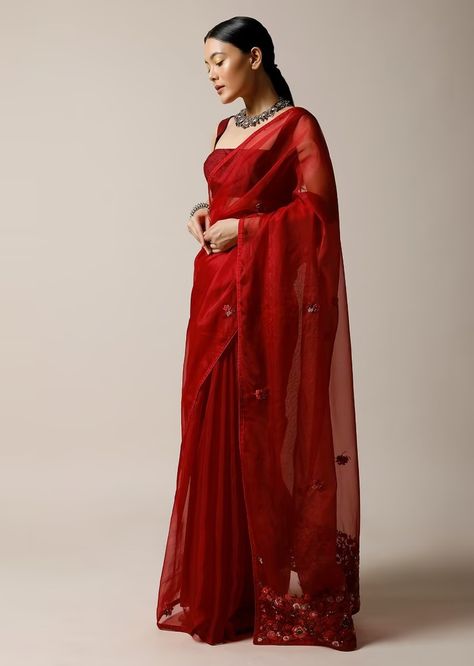 Apple red saree in organza with hand embroidered floral buttis using thread work and matching unstitched blouse. The pallu is enhanced with an elaborate bud embroidered floral design along with sequins highlights.
Paired with a matching unstitched blouse in silk with bud embroidered buttis #KarwaChauth Kalki Sarees, Wedding Sarees Online, Bridal Sari, Fashion Usa, Kalki Fashion, Wedding Saree Collection, Modern Saree, Wedding Sarees, Wedding Saree Indian