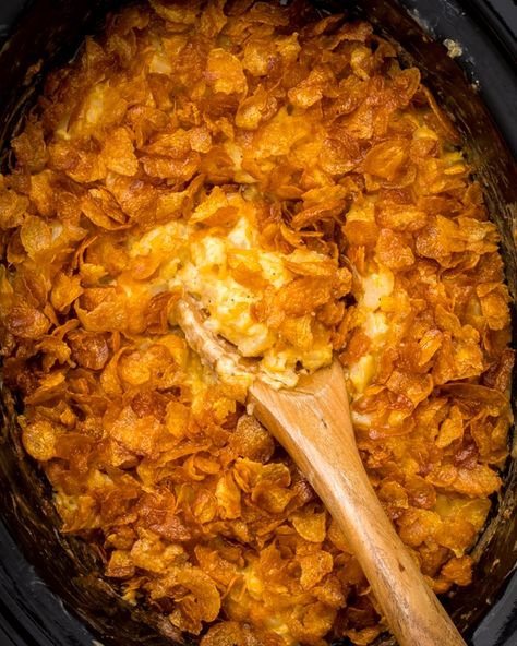 Crockpot funeral potatoes are a great cheesy potato dish made in your slow cooker. Plus, keep it traditional with the crispy corn flake topping! Corn Flake Cheesy Potatoes, Potatoes With Corn Flakes On Top, Corn Flake Potato Casserole, Crockpot Potato Casserole, Cheesy Potatoes Crockpot, Potato Casserole With Corn Flakes, Cornflake Potatoes, Slow Cooker Cheesy Potatoes, Crockpot Cheesy Potatoes