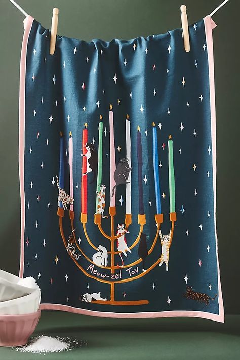 Meowzel Tov Dish Towel | Anthropologie Chanukah Decor, Beads Candy, Festive Cookies, Winter Wood, Candles For Sale, Glass Jar Candles, Outdoor Holidays, Outdoor Holiday Decor, Comfort And Joy