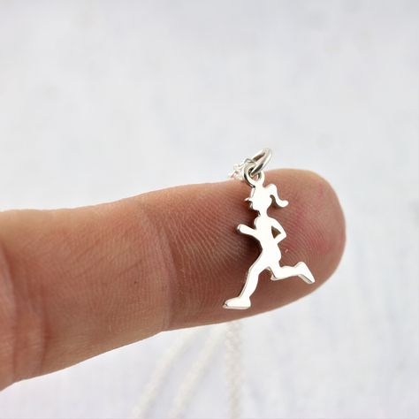 Sterling Silver Runner Necklace. Running and jogging are popular activities both recreationally and competitively. This runner necklace is a great way to show your love of running, whether as a hobby or competitively in marathons!  »  Sterling Silver Runner Charm with soldered jump ring. »  Approximate Charm Size: (15mm x 12mm) or 5/8" »  Sterling Silver Cable Chain  »  Your jewelry purchase will come beautifully packaged for gift giving. ♥ Customize with initial charms or birthstones here: Running Necklace, Running Jewelry, Athlete Gifts, Silhouette Necklace, Running Gifts, Congratulations Gift, Gifts For Runners, Quick Outfits, Initial Charm