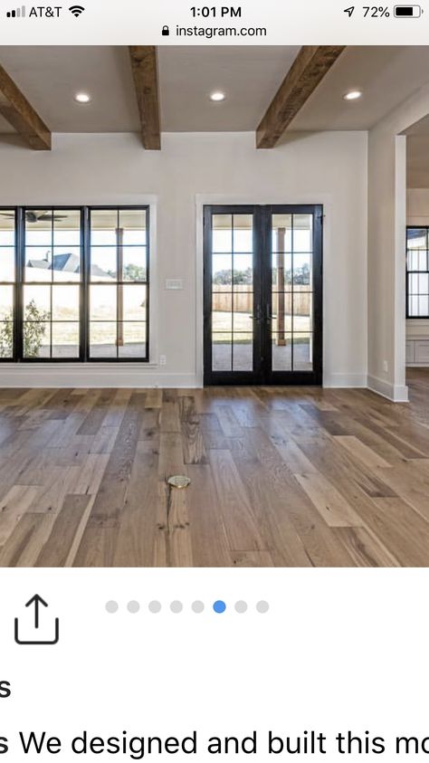 Wall Of Windows With Door, White House Black Trim Cedar Accents Interior, Black Framed Interior Windows, Roman Shades On Black Windows, Great Room Doors And Windows, Brown Windows White Trim, Exterior Windows Styles Farmhouse, Floor Length Windows In Living Room, Tan House With Black Windows