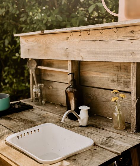 How to Add a Water Pump to a Mud Kitchen — Married & a House  | A Catholic Blog for Homemaking and DIY Mud Kitchen With Water Pump, Outdoor Play Kitchen, Mud Kitchen For Kids, Water Play For Kids, Cottage Outdoor, Gallon Water Jug, Kitchen Set Up, Diy Mud Kitchen, Outdoor Fun For Kids