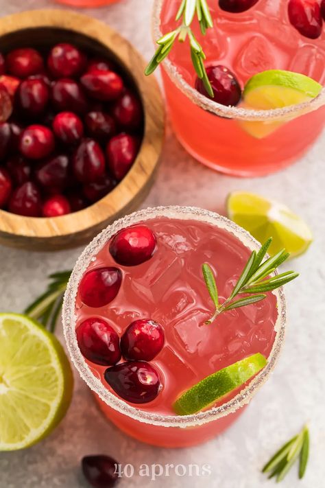 A little sweet, tart, and with a great kick, this cranberry margarita recipe is as easy to throw together as it is beautiful! Perfect for the holidays or anytime, really. Make one at a time or a pitcher! Pitcher Cranberry Margaritas, Cranberry Margarita Recipe, Margarita Pitcher, Homemade Drinks Recipes, Cranberry Margarita, Peach Margarita, Margarita Ingredients, Cranberry Juice Cocktail, Clean Eating Lifestyle