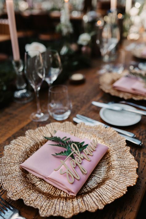 Dusty pink napkin, soft pink wedding decor, bohemian, woodland inspired wedding, botanical wedding vibes, dusty pink and gold coloured wedding styling, wedding table decor, wedding details, wedding style, luxe wedding, gold charger plates, wedding stylist, fern leaves, woodland themed wedding, floral arch #weddingdecor #weddingtabledecor #weddingdetails #weddingphotography #weddinginspiration Gold Charger Plates With Pink Napkins, Dusty Pink Napkins Wedding, Dusty Pink Table Decor, Dusty Pink Wedding Table Decor, Rose Gold Dinner Table Decor, Charger Plates Table Setting, Dusty Pink Wedding Decor, Pink And Gold Table Setting, Chargers Plates Table Setting