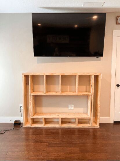 Entertainment Center With Mantle, Simple Fireplace Wall Ideas, Diy Cord Hiding Ideas, Diy Fireplace Half Wall, How To Build Frame For Electric Fireplace, Diy Mantle Tv Stand, Diy Fireplace Media Console, Electric Fireplace Diy Ideas, Diy Fireplace Under Tv