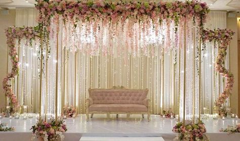 Golden Backdrop Wedding, Flower And Lights Backdrop, Settee Back Wedding Decoration, Valima Decoration, Engagement Decorations Indian, Pakistani Wedding Stage, Marriage Hall Decoration, Engagement Stage, Engagement Stage Decoration