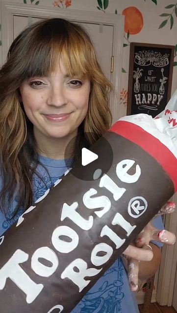 Grace Baldwin on Instagram: "DIY Giant Tootsie Roll  #diy #diyhalloween #diydecor #giantcandy #candydecor #artist #diytutorial #maximalistdecor #handmadedecor" Giant Tootsie Roll Prop, Diy Giant Hershey Kiss Decoration, Christmas Party Candy Table, Giant Candy Decorations Diy, Diy Giant Candy Props, Christmas Candyland, Candy Props, Christmas Party Candy, Candy Decorations Diy