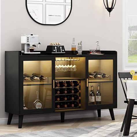 This bar cabinet offers abundant storage space, including wine racks, glass shelves, storage shelves, and cabinets, to keep your bar accessories organized and easily accessible. This item has two beautiful Acrylic doors for displaying champagne, whiskey, and sober utensils, a 22-bottle wine rack, four open shelves, and a spacious surface (47.24"D x 35.4" W x 15.7"H) for preparing food more conveniently. #modern #home #decor #wine #beer #alcohol #cooler #winerack #winecabinet #barcart #ad Liquor Cabinet Bar, Armoire Entree, Coffee Cabinet, Dining Room And Living Room, Wine Bar Cabinet, Kitchen Buffet, Home Coffee Bar, Wine Glass Rack, Glass Rack