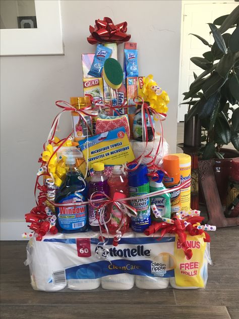 Great move-in gift for leasing. Tower of cleaning supplies. 24 pack of toilet paper, 6 pack paper towels, and then whatever cleaning supplies you want to add on. Cleaning Supplies Gift Basket, Raffle Gift Basket Ideas, Expensive Christmas, Auction Gift Basket Ideas, Fundraiser Baskets, Auction Basket, Homemade Gift Baskets, Auction Baskets, Raffle Basket