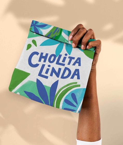 Design Womb | Cholita Linda Restaurant Branding & Packaging Design Mexican Packaging Design, Mexican Food Packaging, Ecuadorian Food, Taco Wraps, Baja Fish Tacos, Packaging Snack, California Restaurants, Fast Casual Restaurant, Takeout Food