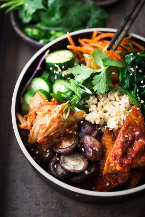 VEGAN Bibimbap- with Gochujang baked Tempeh, steamed veggies, kimchi and pickled cucumber- a healthy vegan version of Bibimbap! | www.feastingathome.com #vegan #bibimbap Vegan Buddha Bowls, Vegan Bibimbap, Bibimbap Recipe, Eat Protein, Baked Tempeh, Feasting At Home, Bowl Meals, Steamed Veggies, Asian Meals