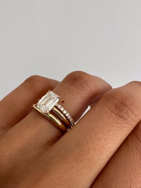 One of our most timeless engagement rings, The Elizabeth features a traditional basket setting. Its simplicity and versatility allows you to style with any wedding band.

Available in three different carat weights, this ring is a modern heirloom made to be treasured—then, now, always.
⠀⠀⠀⠀⠀⠀⠀⠀⠀
Band width: 1.9mm
Total carat weight: 1.4, 1.8, or 2.2ctw
Diamond cut: Emerald
Diamond clarity: VS1
Diamond color: F
Cut, Polish, Symmetry: Excellent Timeless Engagement Rings, Dream Wedding Ring, Timeless Engagement Ring, Fall Rings, Vs1 Diamond, Marquise Shape Diamond, Cute Engagement Rings, Ring Guide, Future Engagement Rings