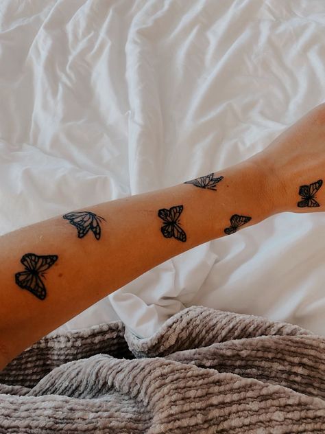 Sleeve Of Butterflies Tattoo, Butterfly Tattoos Going Up The Arm, Up The Arm Tattoos For Women, Butterflies Around Wrist Tattoo, Forarm Butterflies Tattoo, Scattered Butterfly Tattoo, Butterfly Up Arm Tattoo, Butterfly Tattoos On Forearm, Butterfly Forearm Tattoo Half Sleeves