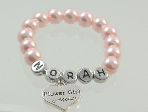 Personalized Flower Girl Pearl Bracelet in the Color Blush #blushpearls #nameflowergirl #flowergirl #personalized #wedding #weddingjewelry #jewelry #namebracelet #heartcharm #pealbracelet #blushwedding Flower Girl Bracelet, Flower Girl Ideas, Name Flower, Flower Girl Bracelets, Girl Bracelet, Gold Wedding Theme, Best Gifts For Him, Diy Gifts For Kids, Pearl Jewelry Wedding