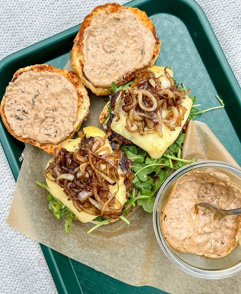 Cheeseburgers with Black Garlic Aioli and Caramelized Onions Garlic Burger Sauce, Lettuce Burgers, Fermented Garlic, Steak Rubs, Garlic Aioli, Black Garlic, Toast Toppings, Burger Sauce, Steak Sandwich