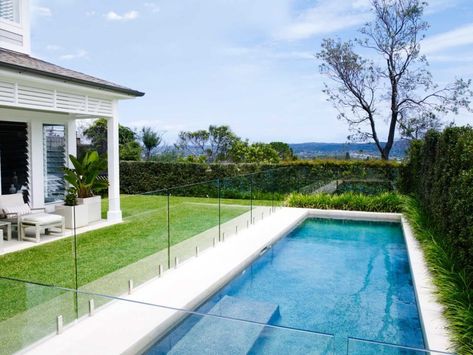 A coastal Hamptons home with sweeping ocean views - Style Curator Living Pool, Coastal Hamptons, Outdoor Fireplace Designs, Brick Fence, Pool Landscape Design, Front Yard Fence, Backyard Pool Landscaping, Modern Fence, Hamptons House