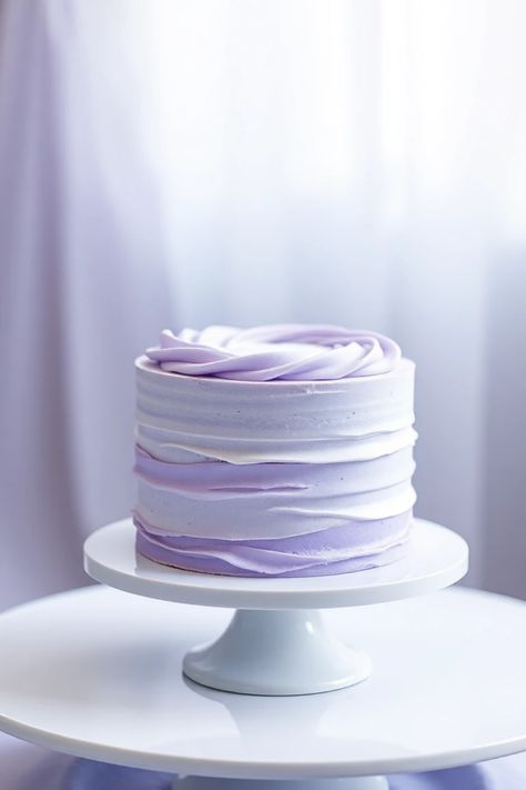 Looking to add some charm to your celebrations? Check out these 25 delightful lilac cake ideas that not only please the eyes but also the taste buds! From subtle lavender flavors to breathtaking floral designs, each cake brings a unique touch. Whether it's a springtime party, a birthday bash, or a simple get-together, there's a cake here perfect for any occasion. These recipes and decoration tips will surely inspire sweet treats that make your parties memorable and beautiful. Choose your favorite cake today and create a tasty masterpiece! Purple Cake Decorating Ideas, Lilac Cake Ideas, Smash Cake Purple, Lavender Colour Cake, Purple Bday Cake, Simple Cake Designs Birthday, Lavender Birthday Cake, Lilac Cakes, Lavender Frosting