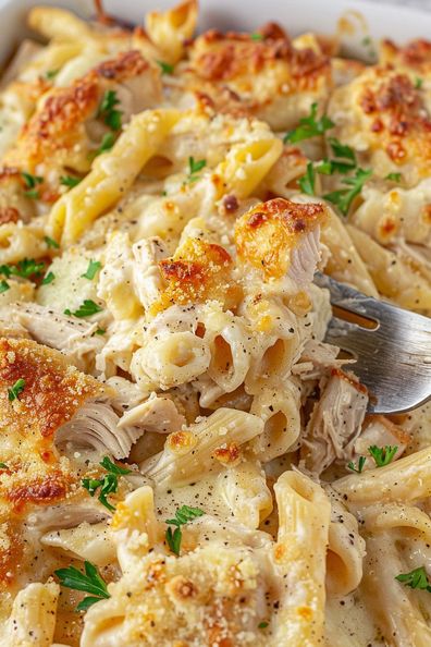 Garlic Parmesan Chicken Pasta Bake - a creamy, cheesy, easy-to-make dinner perfect for weeknights. Try this family favorite tonight! Garlic Parmesan Chicken Pasta, Parmesan Chicken Pasta, Creamy Parmesan Chicken, Garlic Chicken Pasta, Chicken Pasta Casserole, Garlic Parmesan Pasta, Cheesy Chicken Pasta, Chicken Parmesan Pasta, Creamy Chicken Pasta