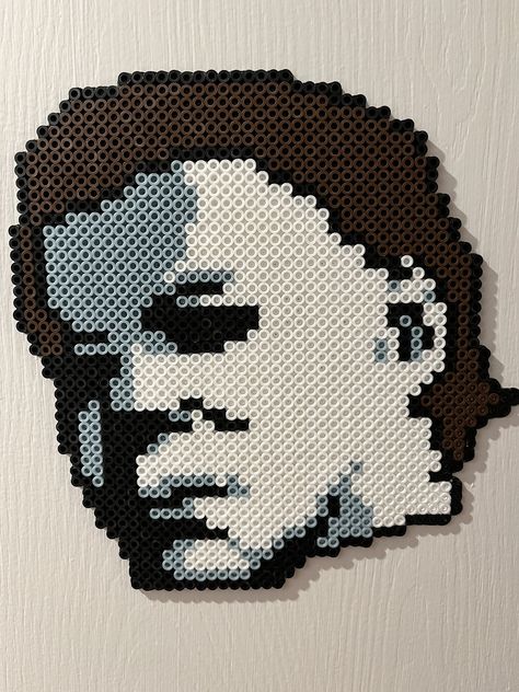 This is a handmade Micheal Myers design made of perler beads. This can be framed or displayed as is. Very lightweight and easy to display in any horror collection, display, or setting. Perfect for any and all horror fans. Gorilla Tag Perler Beads, Haunted Mansion Perler Beads, Michael Myers Perler Beads, Pearler Bead Halloween, Coraline Perler, Horror Perler Bead Patterns, Horror Perler Beads, Beads Halloween, Bead Templates