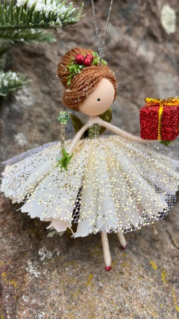 Wands and Willows on Instagram: "The best things come with small red packages! 🎁❄️🎁❄️🎁 . Happy Friday, everyone! New holiday fairy ornaments are slowly arriving to the shop! And, I just added this cutie! To adopt, visit my Etsy shop: www.wandsandwillows.Etsy.com . . . . . #christmasfairy #christmasornament #handmadedoll #fairyvibes #fairieslivehere #holidaygift #christmascrafts #dollhouseminiatures #fairydoll #fairygarden #natureinspired #fairymagick #dollmaker #reels #christmastree #christma Fairy Ornaments Diy, Fairy Christmas Ornaments Diy, Christmas Fairy Dolls, Diy Fairies Doll Easy, Fairy Diy Crafts, Fairy Ornaments, Forest Dragon, Needle Felted Christmas Fairy, Christmas Flower Fairy Dolls