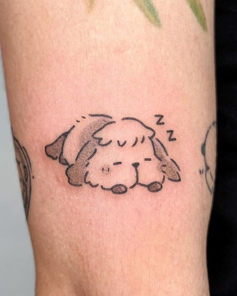 pigeon ✱ handpoke tattoos on Instagram: "Handpoked a Heen from Howl’s Moving Castle the other day!!😭💛 he’s so underrated but I adore him #handpoked" Studio Ghibli Tattoos Howls Moving Castle, Howls Moving Castle Heen Tattoo, Small Howls Moving Castle Tattoos, Subtle Howls Moving Castle Tattoo, Small Tattoos Studio Ghibli, Howls Moving Castle Matching Tattoos, Studio Ghibli Howls Moving Castle Tattoo, Howells Moving Castle Tattoo, Simple Ghibli Tattoo