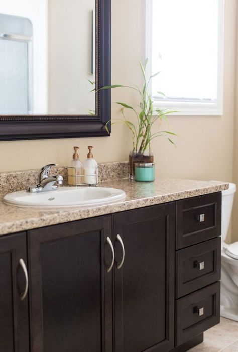 dark brown cabinets with a granite countertop Bathroom Brown Tile, Cheetah Decor, Dark Brown Bathroom, Bathrooms Sinks, Brown Bathroom Vanity, Dark Brown Floor, Brown Countertop, Bathroom Dark, Color Bathroom Design